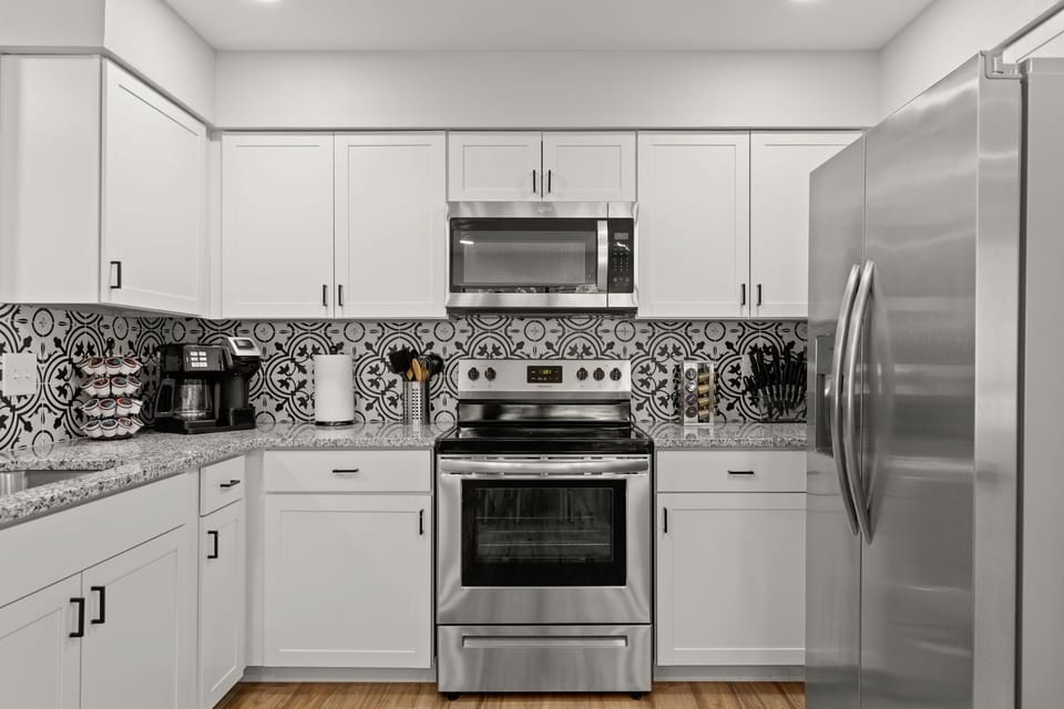 Unleash your inner chef in our fully stocked Airbnb kitchen, where every tool and utensil you need is at your fingertips.