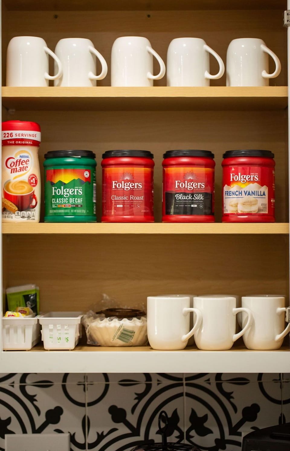 Start your day right in our well-equipped kitchen, complete with a variety of coffee mugs, coffee mate, and an assortment of gourmet coffee options for the perfect brew.