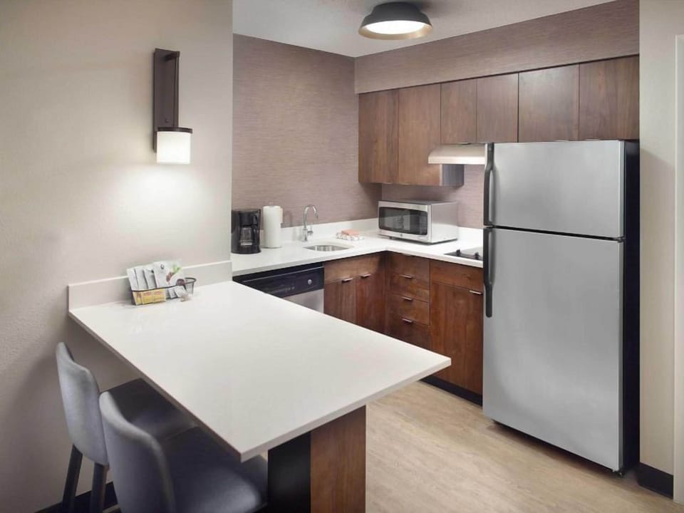Start mornings with coffee and snacks at the roomy island.