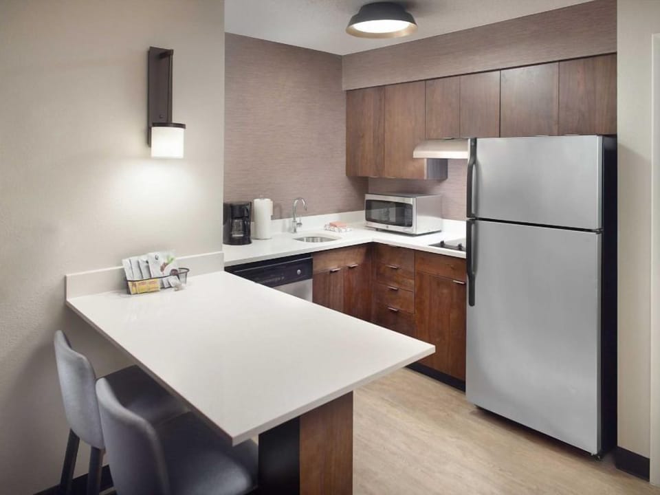 Start mornings with coffee and snacks at the roomy island.