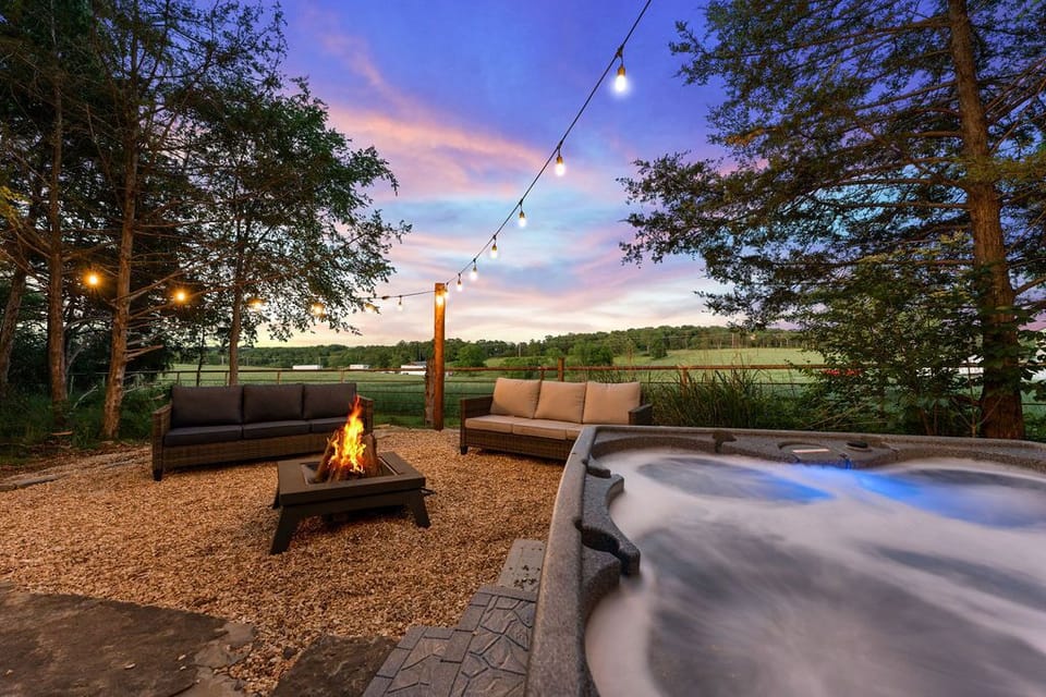 Another view of the back patio from the hot tub. You can see our neighbors field on the other side of the fence -- sometimes, you can even see their cows!