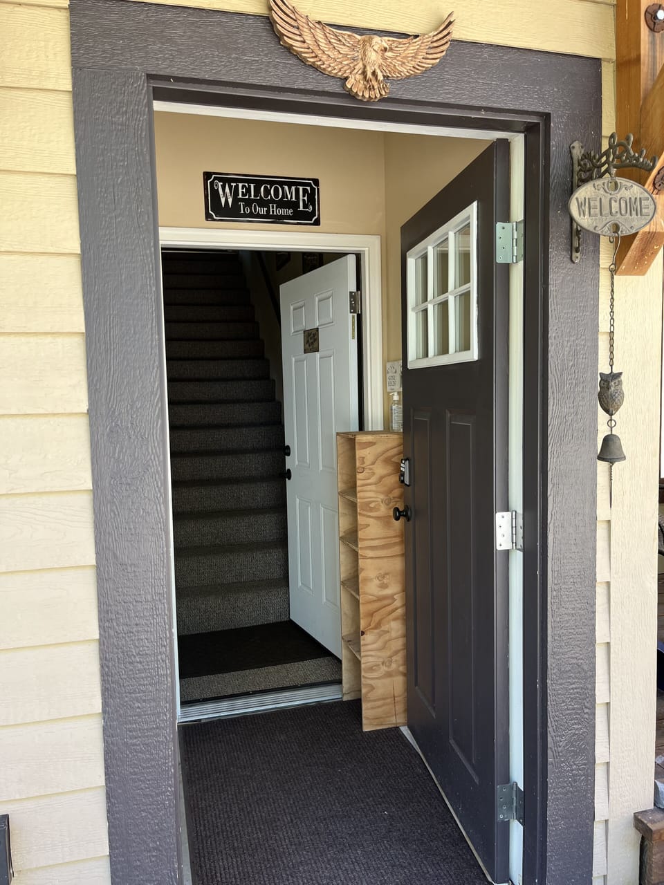 Entry way with shoe rack.