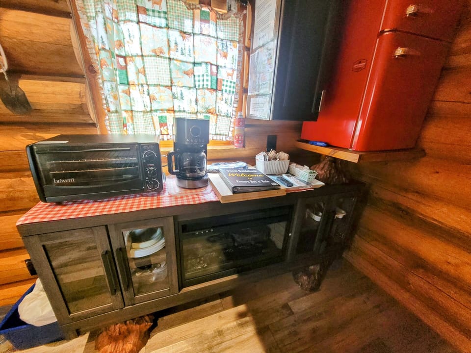 coffee nook, electric fireplace, fridge/freezer