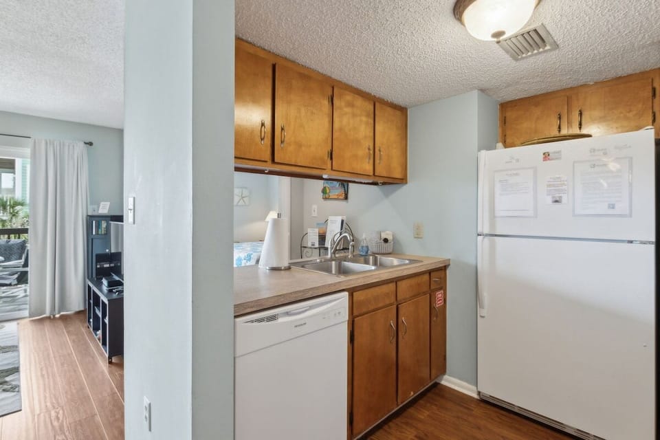 Kitchen with Full-Size Appliances at Down by the Sea, a beachfront Sand Dollar Villas vacation condo.