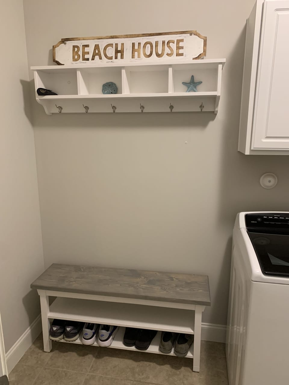 Laundry Room bench seat and coat area