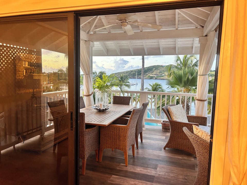 View of outside dining area from inside the villa