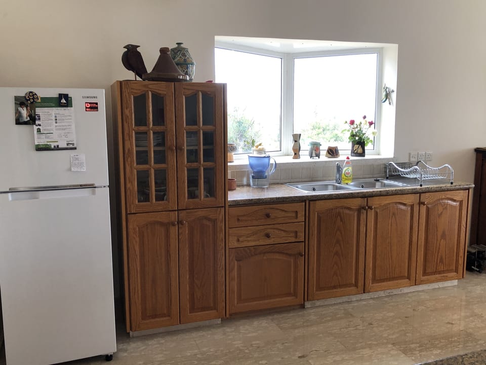 Kitchen with abundant lighting