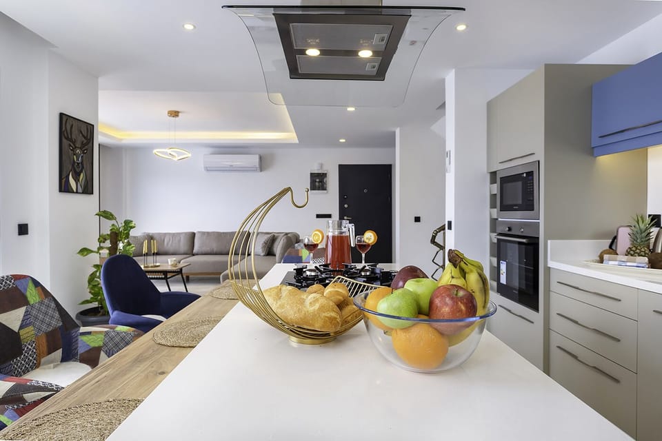 Open plan fully fitted kitchen with an island unit