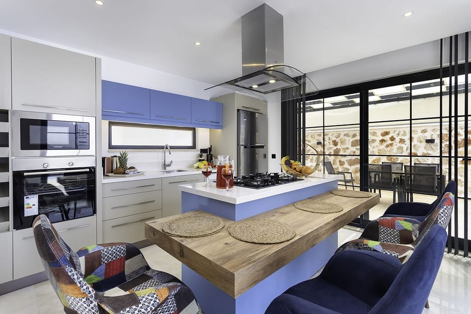 Open plan fully fitted kitchen with an island unit
