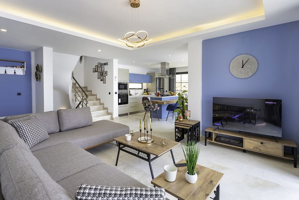 Modern lounge area equipped with a 50'' HD Smart TV