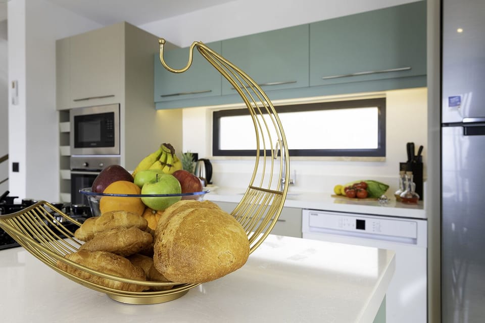 Open plan fully fitted kitchen with an island unit