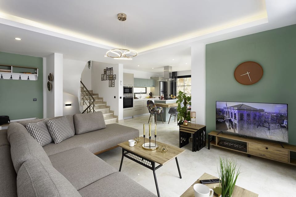 Modern lounge area equipped with a 50'' HD Smart TV