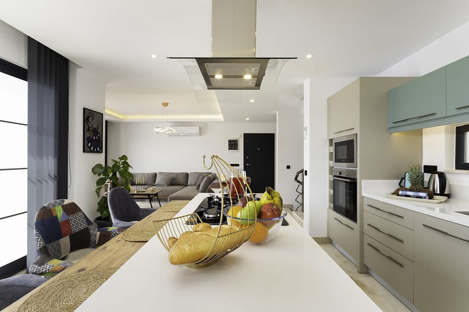 Open plan fully fitted kitchen with an island unit