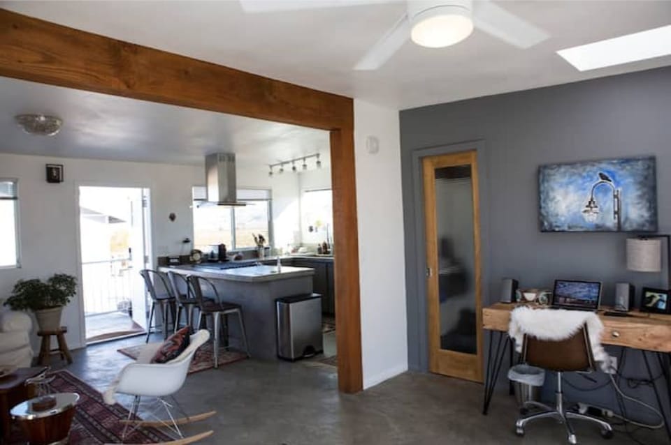 From back of the house to front door and kitchen