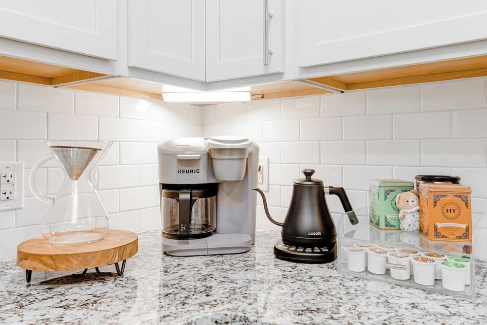 Coffee, Tea, take your pick. Chemex 8 Cup Glass Pour Over Coffee Maker, Keurig coffee maker with K cups, and Cosori kettle. Unbleached filters are also provided. 

 Can you spot Goldilocks and the three bears in our cabin? 