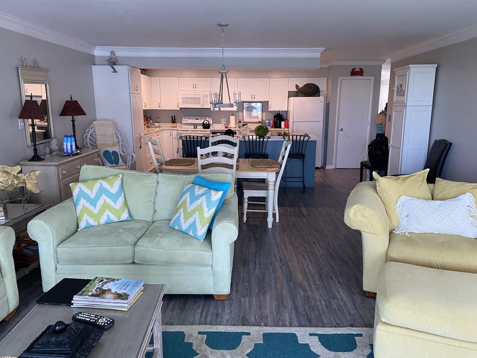 Living & dining areas and kitchen viewed from deck entrance.
