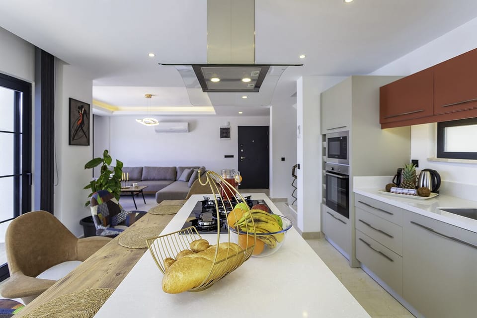 Open plan fully fitted kitchen with an island unit