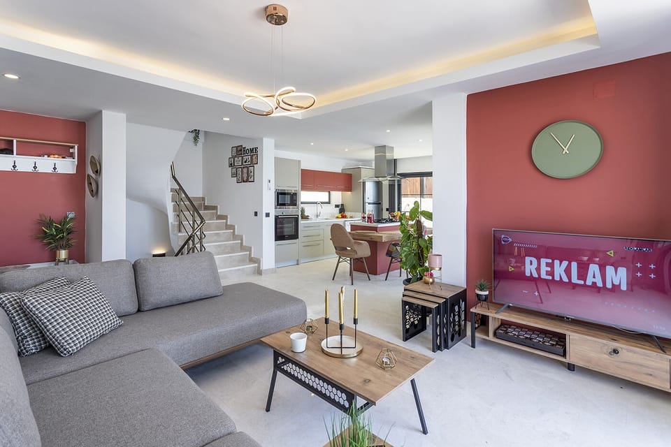 Modern lounge area equipped with a 50'' HD Smart TV