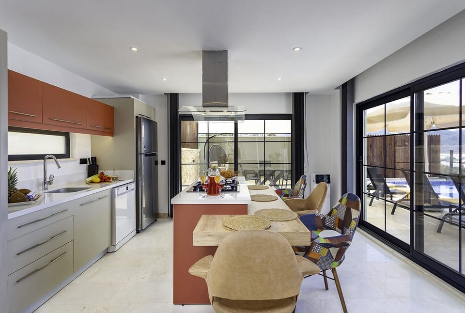 Open plan fully fitted kitchen with an island unit