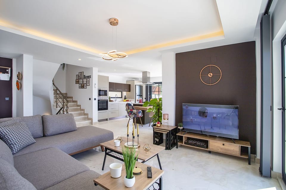 Modern lounge area equipped with a 50'' HD Smart TV