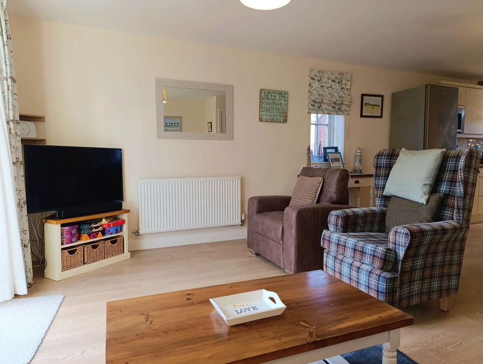 Spacious lounge area with comfortable, varied seating
