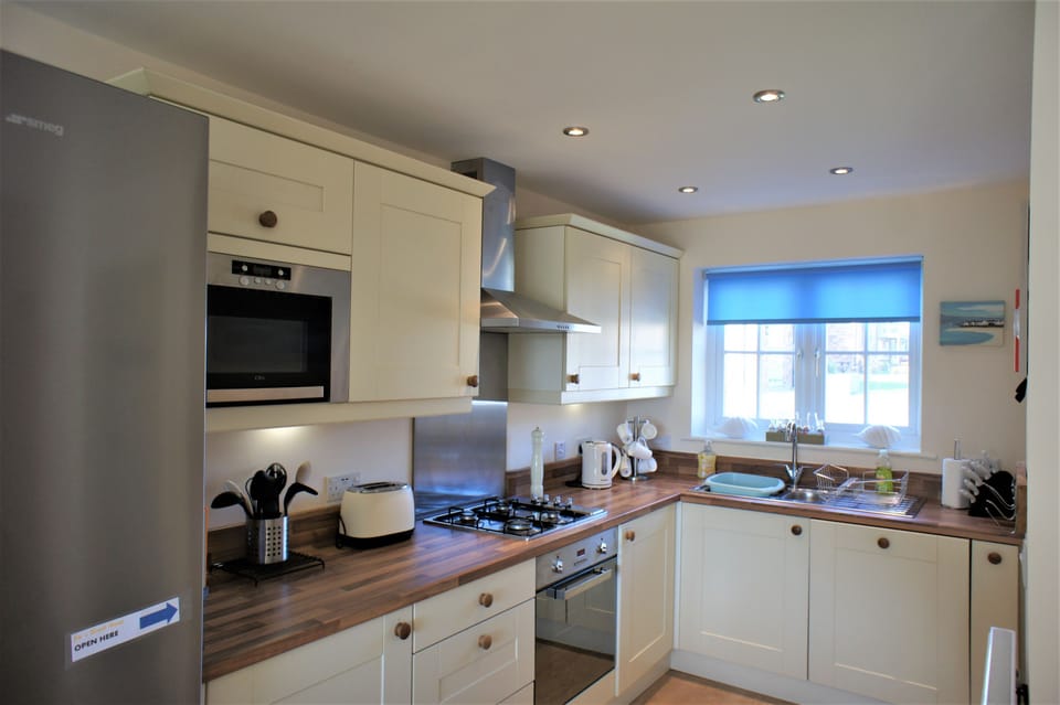 Well equipped kitchen with 2.1M Smeg fridge freezer