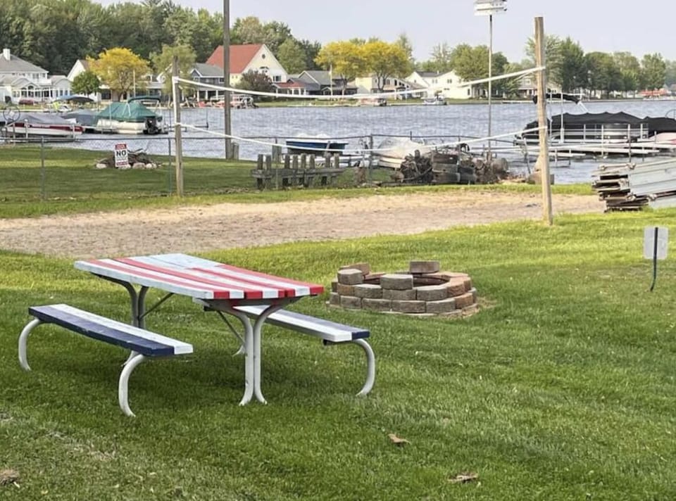HOA common grounds beach area and volleyball court. There’s a sandbox also 