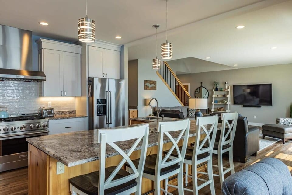Chef's Kitchen with Full-Size Island and Stainless Appliances