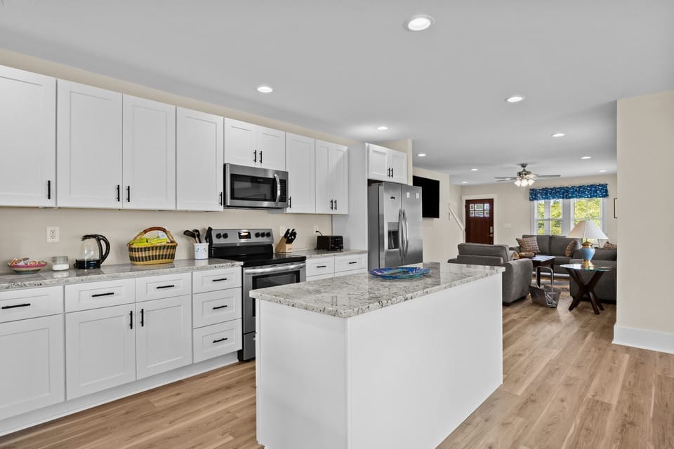 The kitchen with the dining and living areas. As you can see is very spacious.