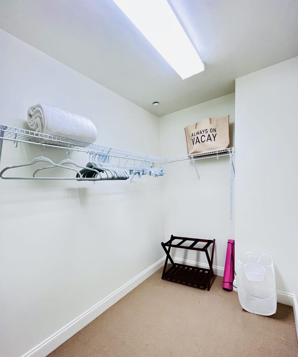 Blanket, luggage rack, mesh laundry bag, yoga mat and luggage rack