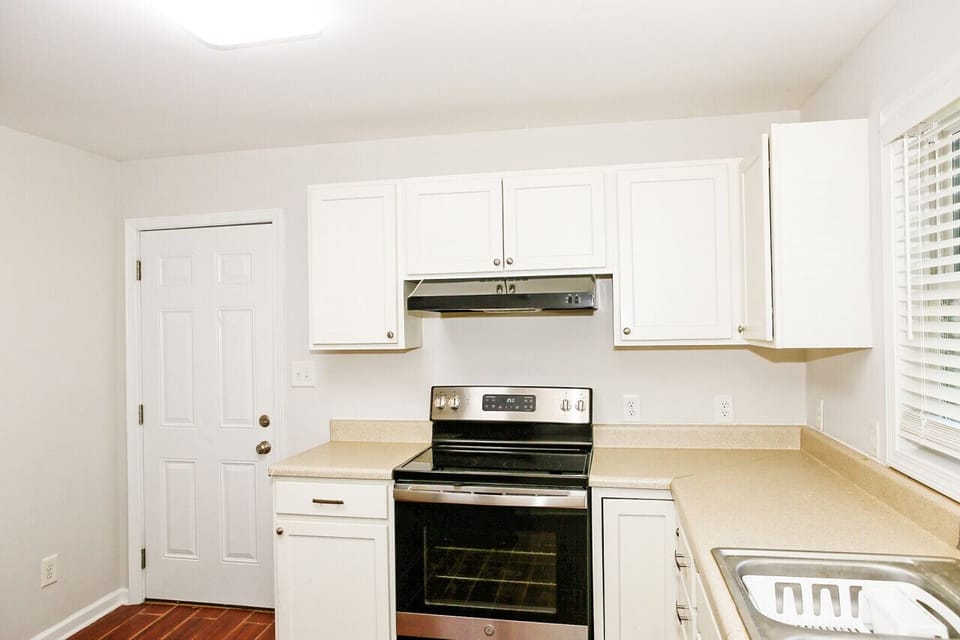 Kitchen leads to back deck