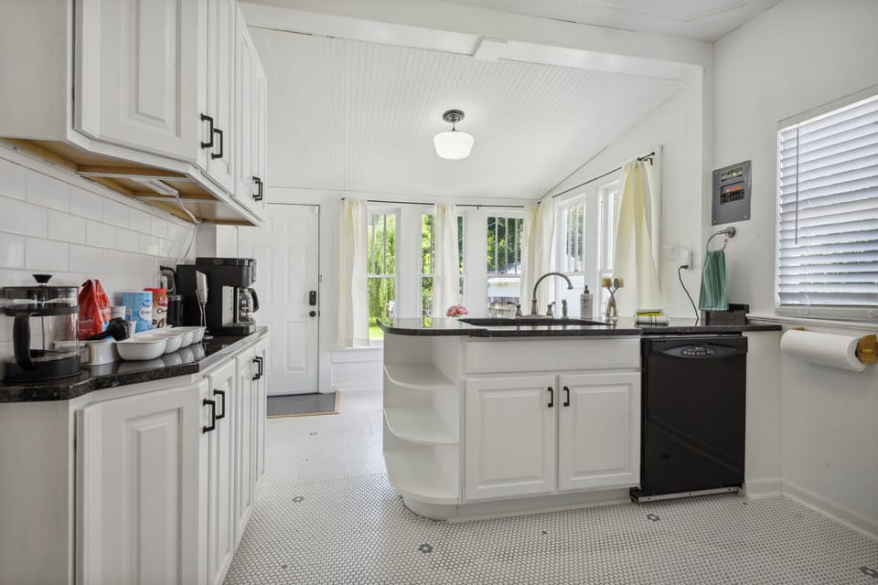 Sip on some coffee while looking out through the bright windows to the backyard.