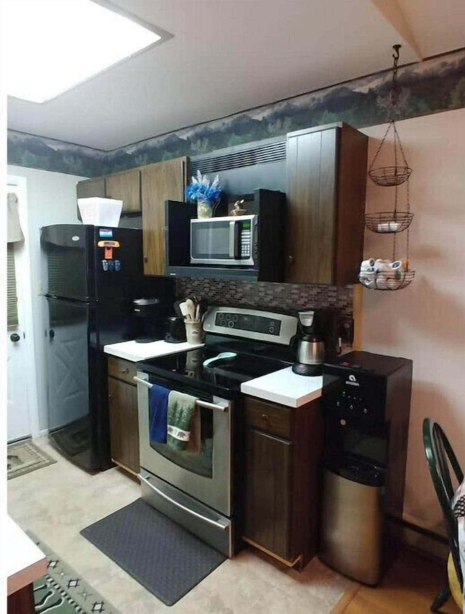 Cabin has a regular coffee maker, a Keurig coffee maker, coffee pods, & creamer.