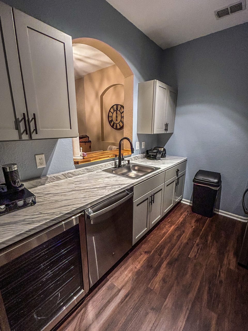 Fully stocked kitchen - dishware, utensils, air fryer, keurig, and wine fridge