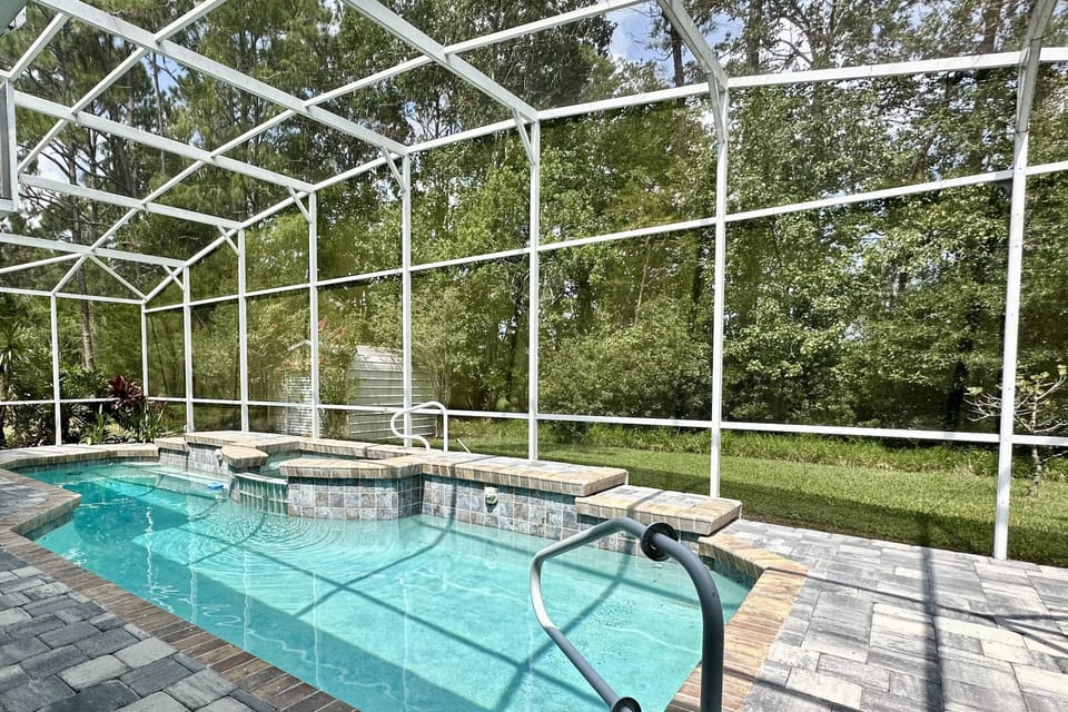 Enjoy our inviting outdoor patio, complete with sparkling pool (w/ separate seating area - not a hot tub), seating area and bbq grill.