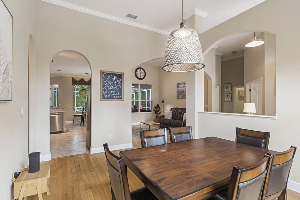 The dining room, conveniently located just off the kitchen, creates a seamless flow for meals and entertaining.