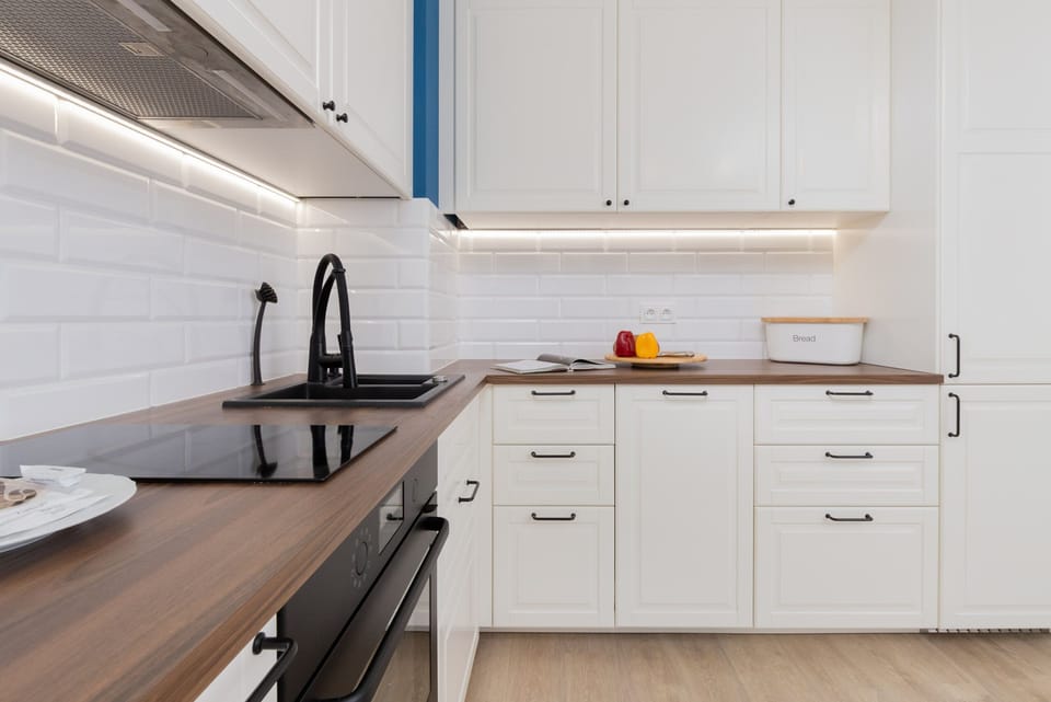 The kitchenette's practical layout maximizes space and functionality.