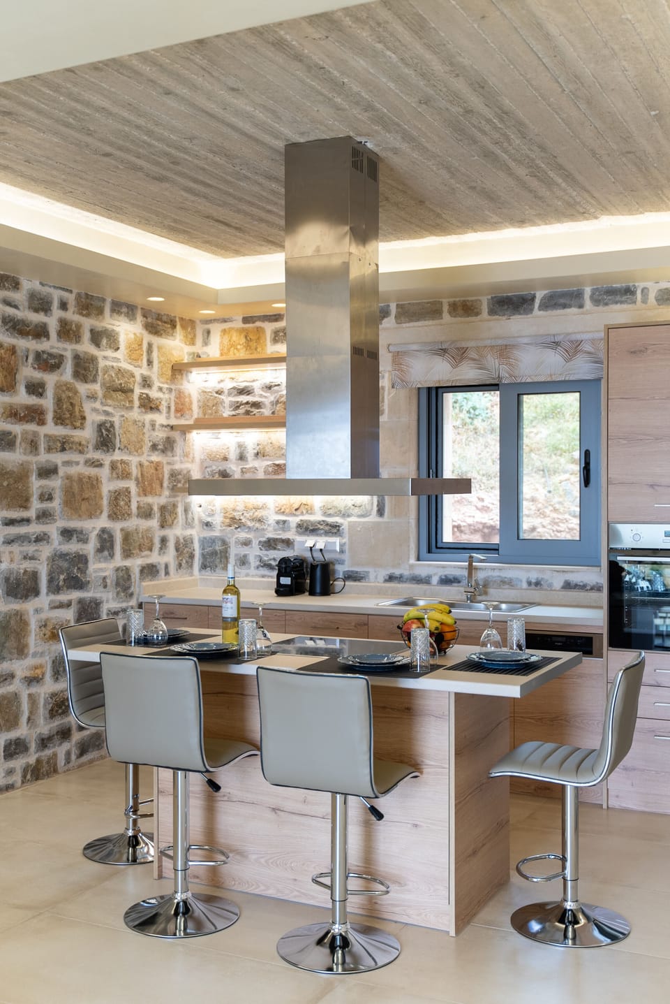 The kitchen counter with chairs