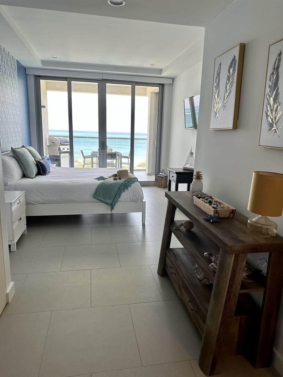 Primary Bedroom with En-Suite Bath & Serene Tropical Décor