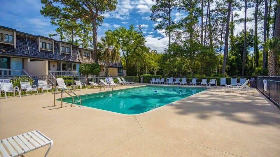 Poolside Convenience - Enjoy easy access to the community pool, just steps from the back deck—perfect for a quick dip or a relaxing afternoon in the sun.