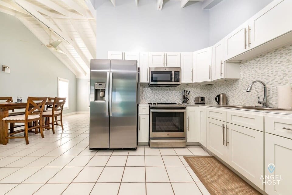 Large, well-equipped kitchen for home cooking.