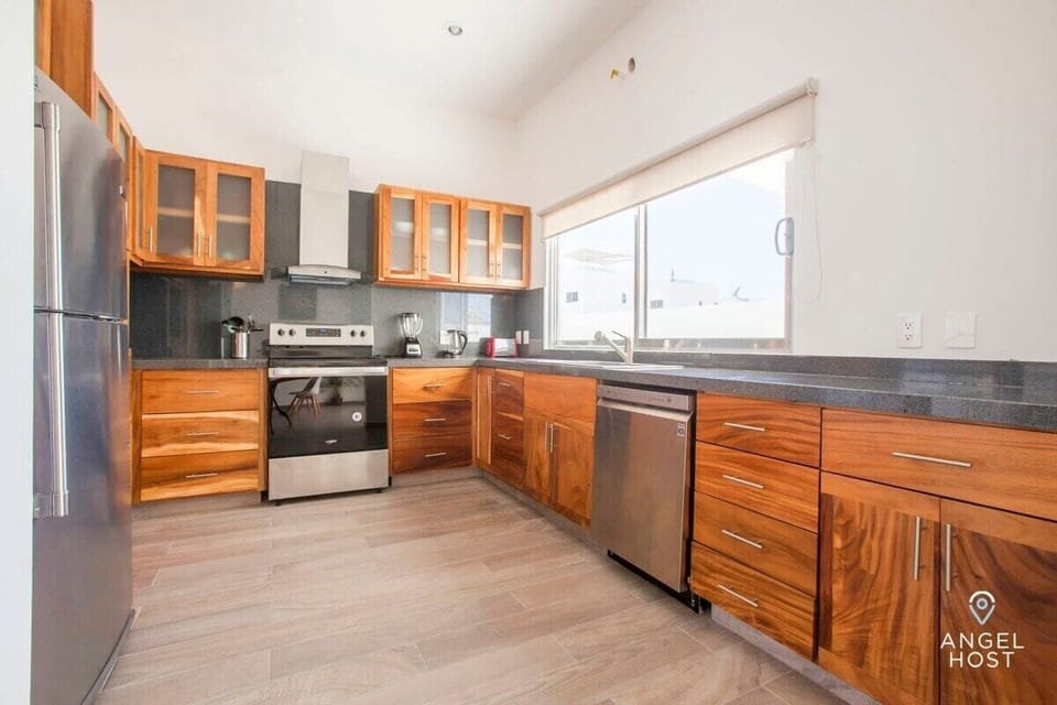 The fully-equipped kitchen has lots of counter space for easy meal prep