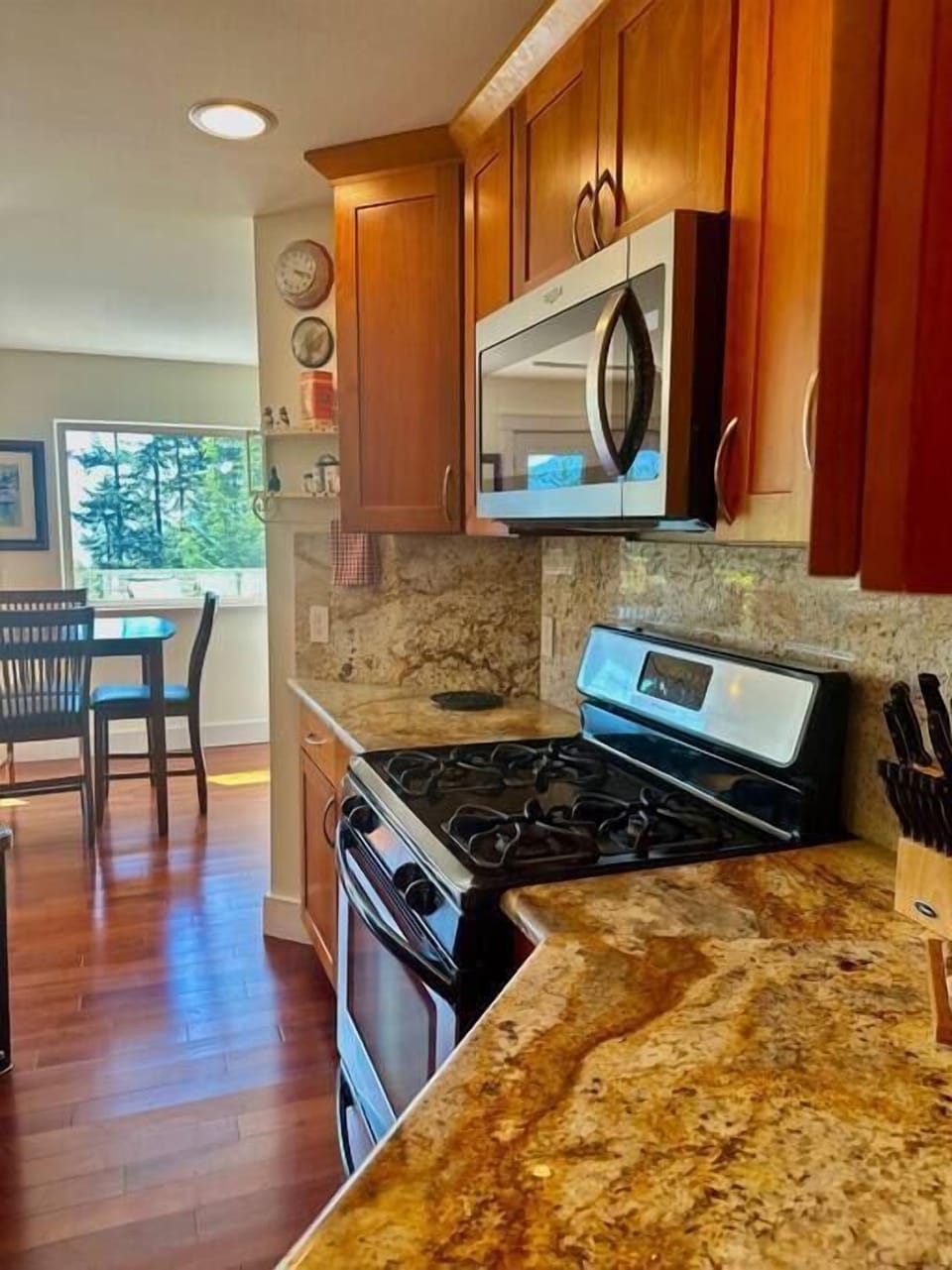 Oven, 4-burner stove, microwave and tons of counter space. Dishwasher, island. 
