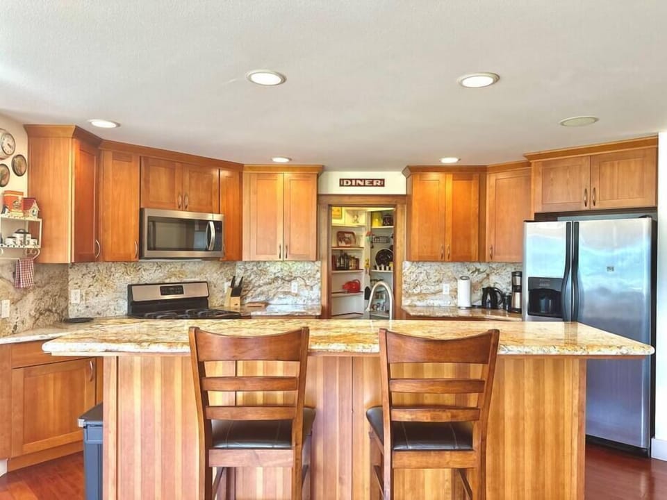 Complete kitchen setup with dishes, cookware, spices and all essentials. 