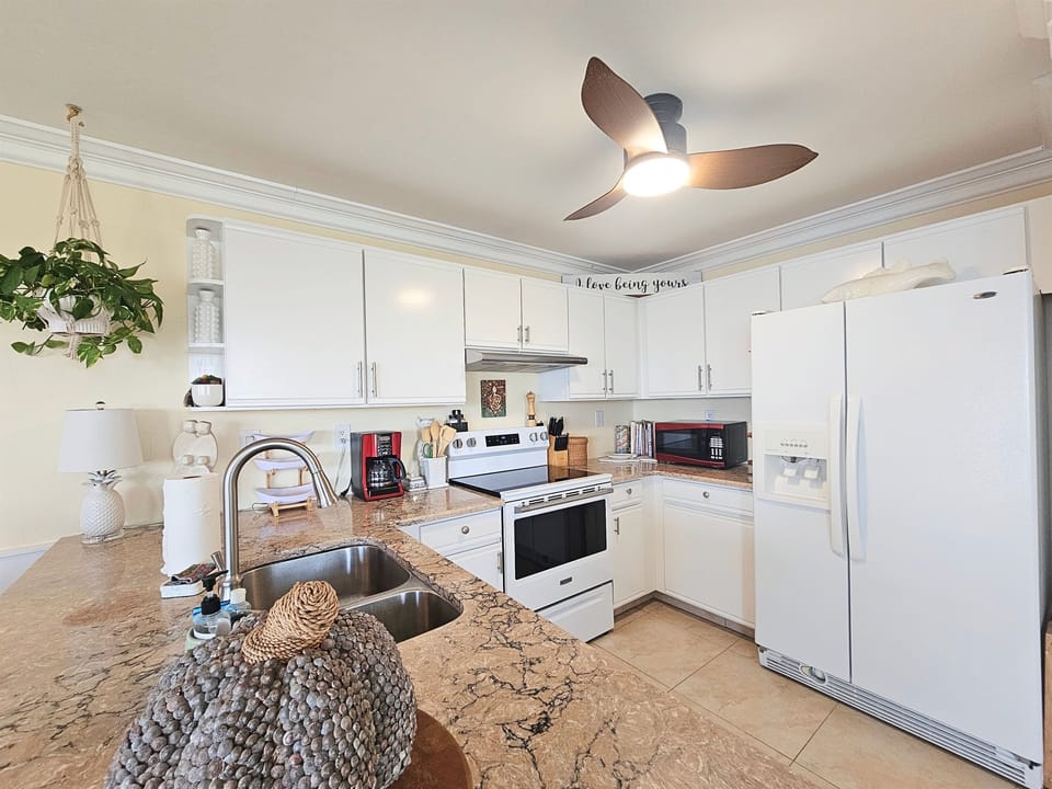 Fully Stocked Kitchen With Dishwasher