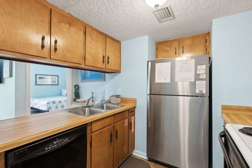 Prepare vacation meals in the fully equipped kitchen with full-size appliances and ample counter space.