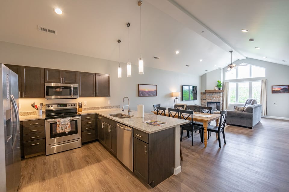 View of Kitchen, Dining Area, and Living Room