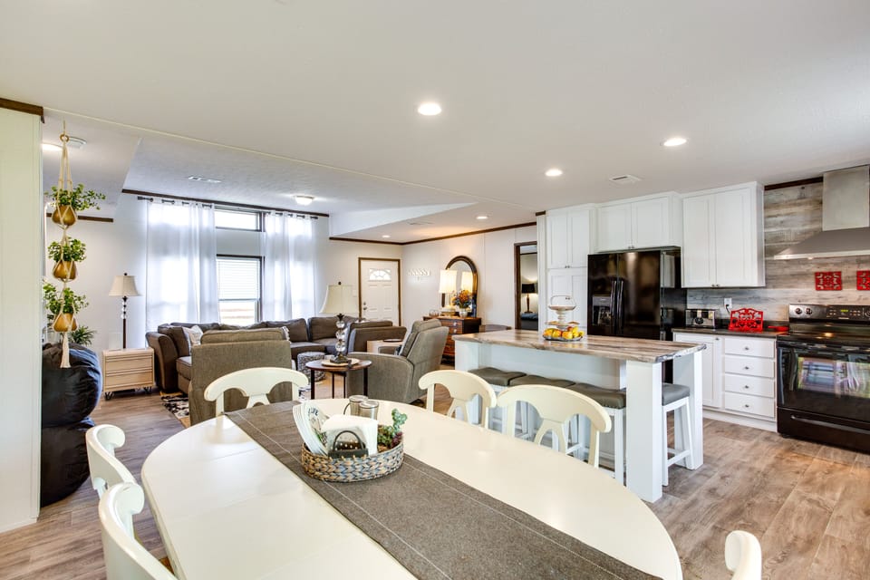 Dining Area | Dishware & Flatware Provided | Breakfast Bar w/ Additional Seating