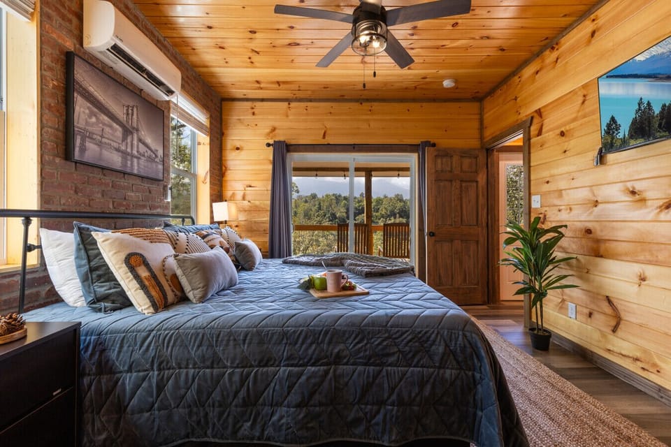 Bedroom 1: Lay back, relax, and take in mountain magic.