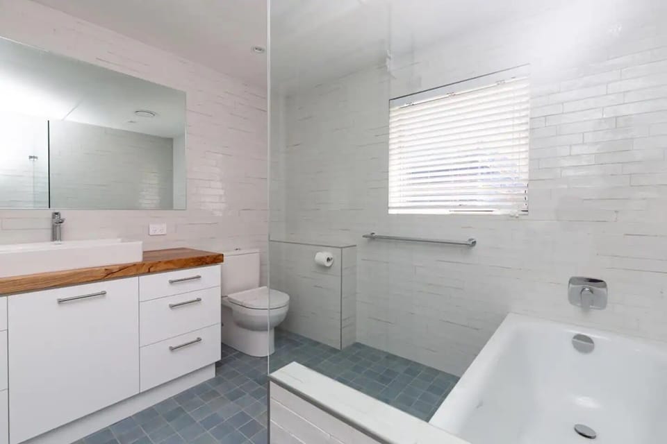 The main bath has been lovingly renovated to the highest spec. With a separate bath to bathe the kids in our soak sore muscles from time spent at the beach. 